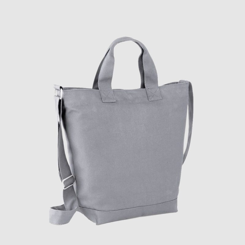 Custom sling bag, in grey with top handle and adjustable cross body/shoulder strap, zip top closure