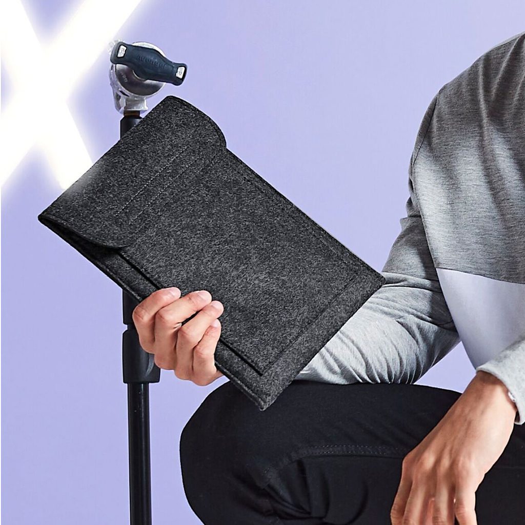 Man Holding Charcoal Boutique iPad® Sleeve