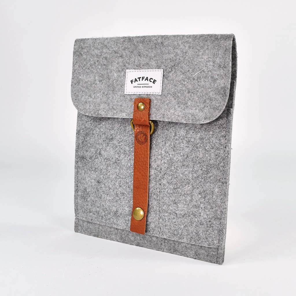 grey felt ipad case with brown leather strap detail