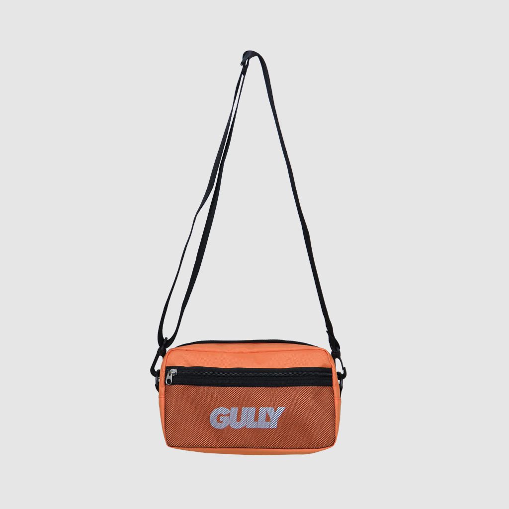 branded waist bag in orange with black zip and strap