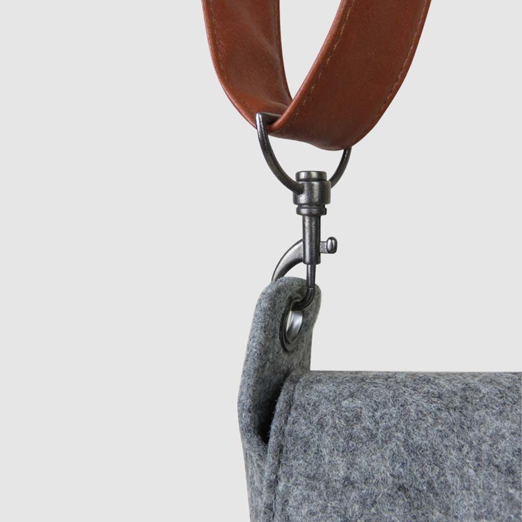 adjustable metal detail on vegan leather strap