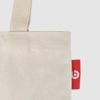 small tote bag in natural fabric with red screen print and woven logolabel