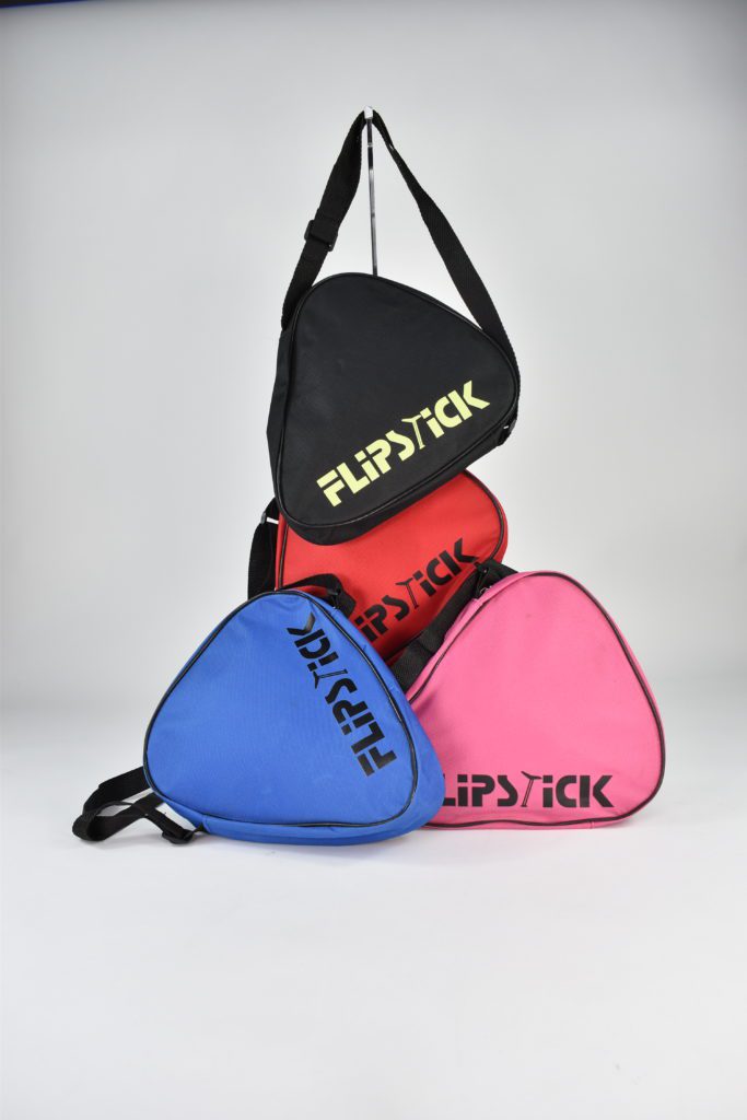 4 product bags hanging up in different colours