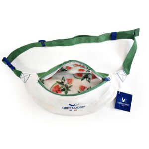 an open bag is shown with an unzipped opening displaying a repetitive print of water melons