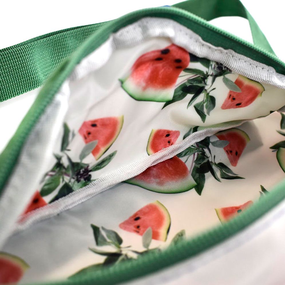 up close image of detailed watermelon print on inside of open zipped bum bag for Grey Goose