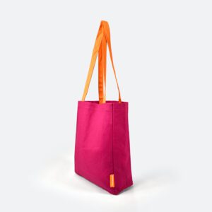 side view of A4 bag with handles up in pink with orange handles