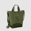 side view of green satchel bag with short handle and long adjustable handle